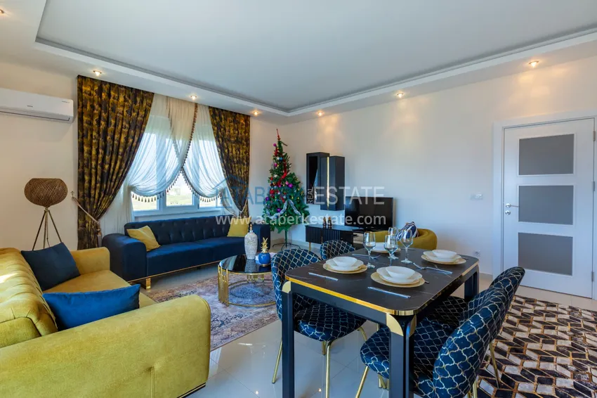 Приобрести Трехкомнатная квартира под ключ в Махмутларе, с видом на горы и застекленным балконом 6 