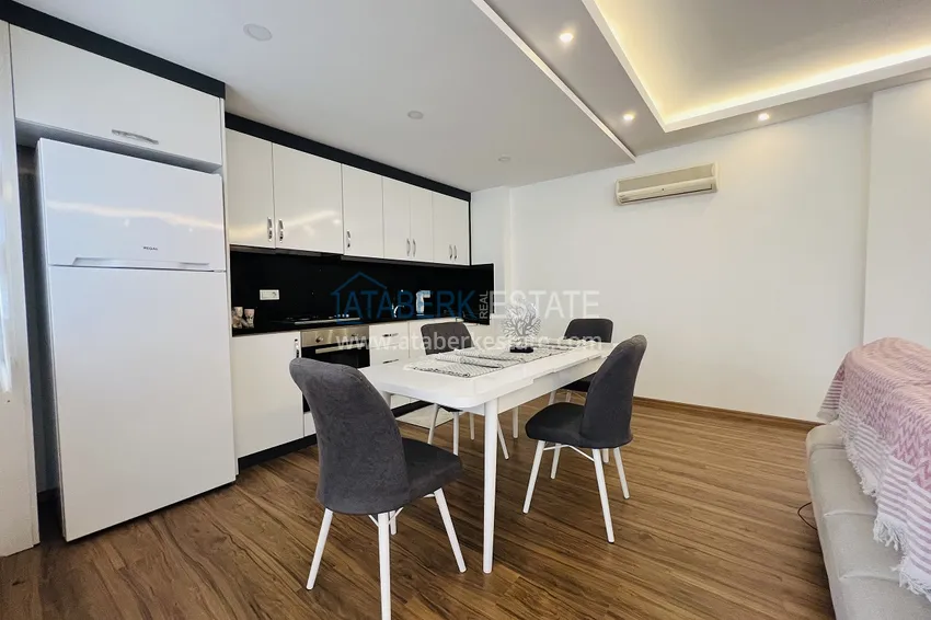 Приобрести Квартира в Махмутларе на центральной улице – современный интерьер, в 100 метрах от моря 6 