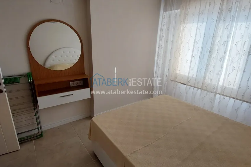 Приобрести Трехкомнатная квартира с мебелью и панорамным видом на море в Чешмели, Мерсин 6 