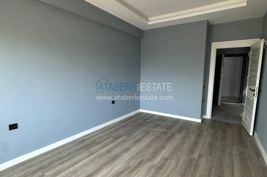 Приобрести Двухкомнатная квартира в Мерсине, район Арпачбахшиш в 300 метрах от моря 6 