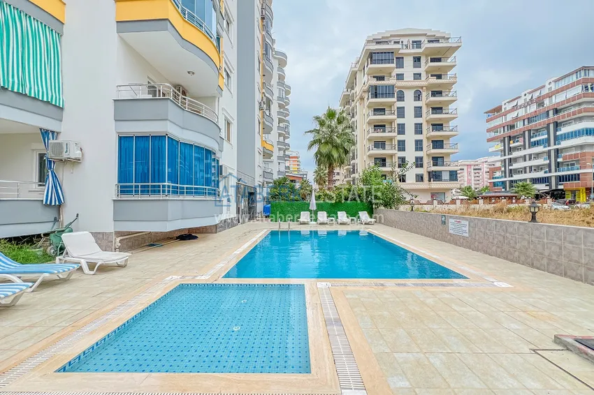 Квартира под ключ с застекленным балконом в Махмутларе на центральной улице, в 150 метрах от моря 6