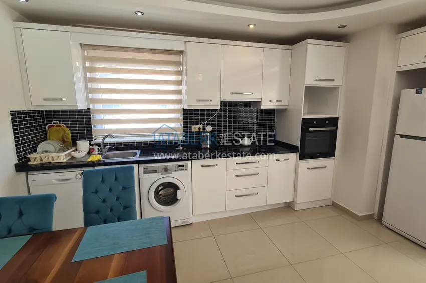 Приобрести Квартира 2+1 с мебелью, застеклённым балконом и видом на горы, район Махмутлар – Алания 6