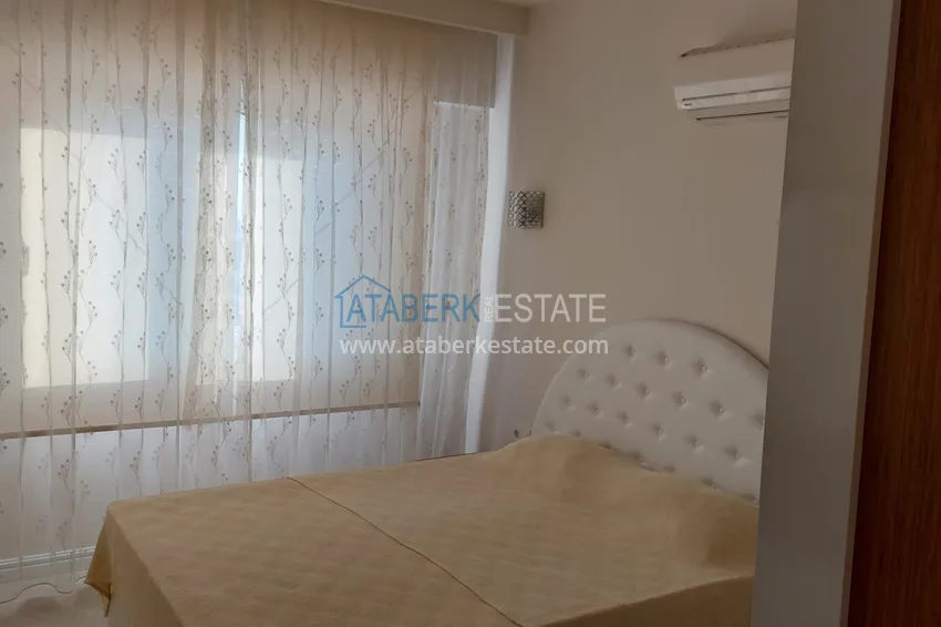 Приобрести Трехкомнатная квартира с мебелью и панорамным видом на море в Чешмели, Мерсин 7 