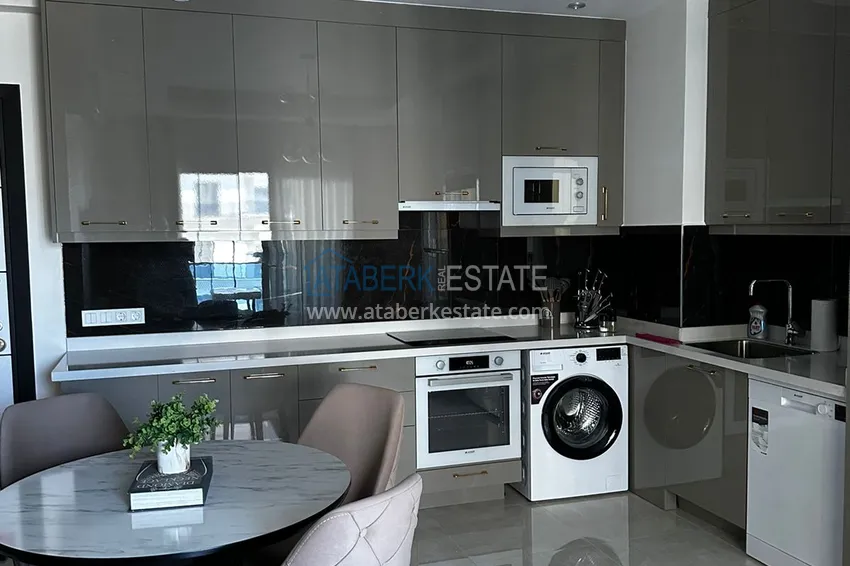 Приобрести Двухкомнатная квартира под ключ с застекленным балконом - Махмутлар, р-н субботнего рынка 8