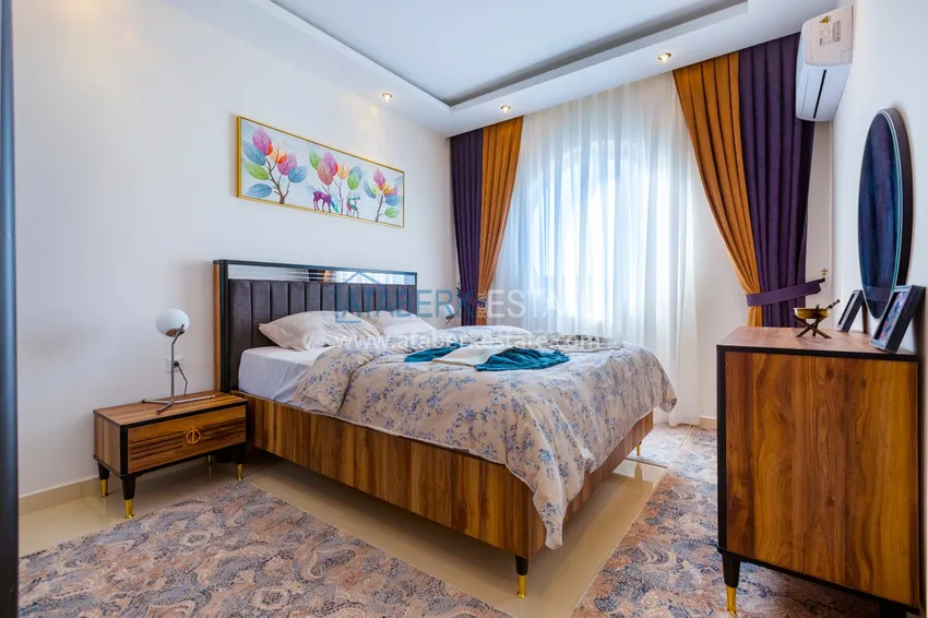 Приобрести Трехкомнатная квартира под ключ в Махмутларе, с видом на горы и застекленным балконом 7 