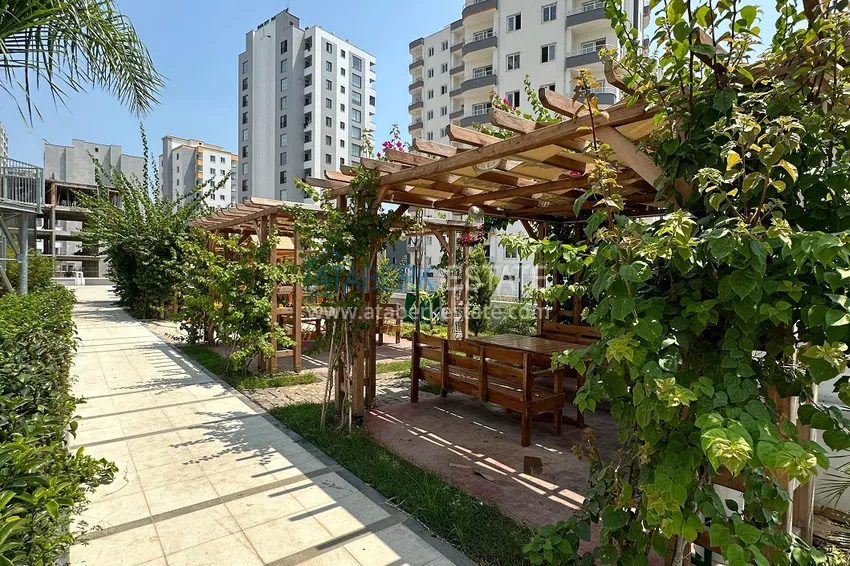 Двухкомнатная квартира в Мерсине, район Арпачбахшиш в 300 метрах от моря 8 