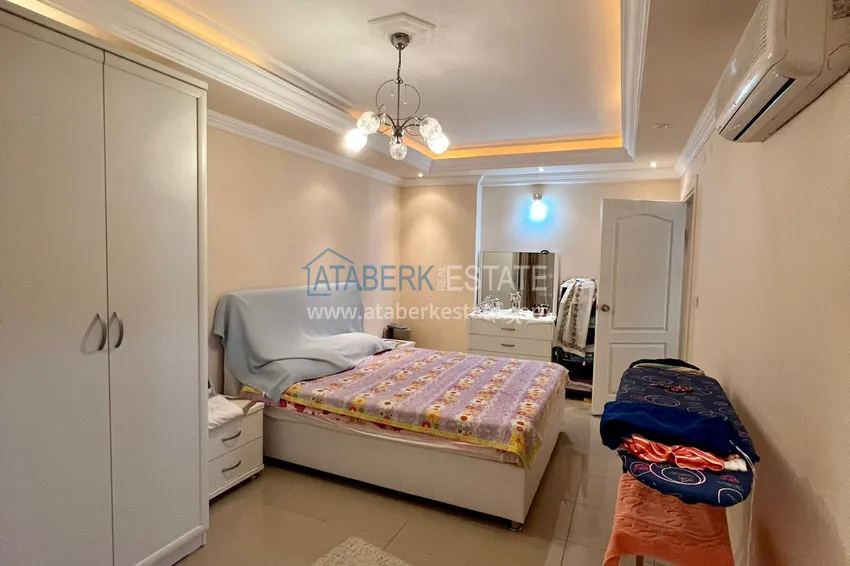 Приобрести Трехкомнатная квартира в Махмутларе с мебелью в комплексе на первой береговой линии 6 