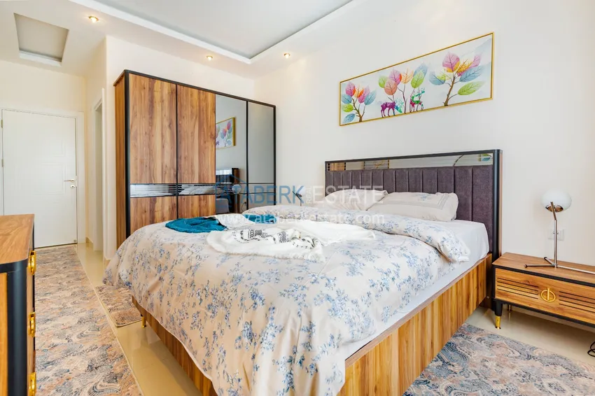 Приобрести Трехкомнатная квартира под ключ в Махмутларе, с видом на горы и застекленным балконом 8 