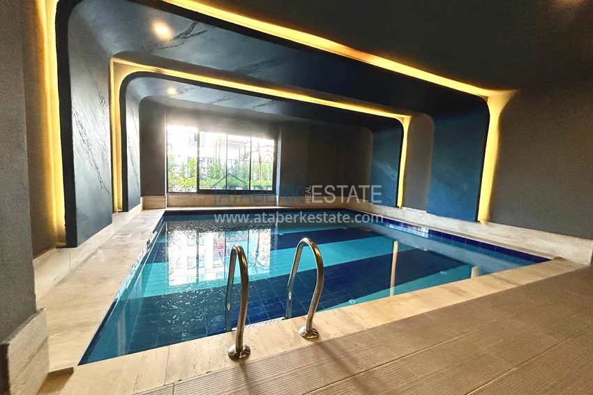 Двухкомнатные квартиры с чистовой отделкой в районе Махмутлар, Алания 14 