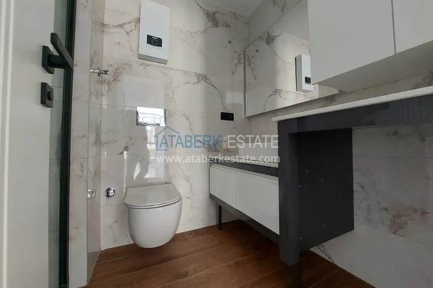 Приобрести Двухкомнатная квартира 75 м2 в центре Алании в новом жилом комплексе 9 