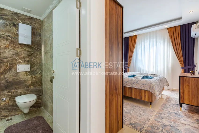 Приобрести Трехкомнатная квартира под ключ в Махмутларе, с видом на горы и застекленным балконом 10 