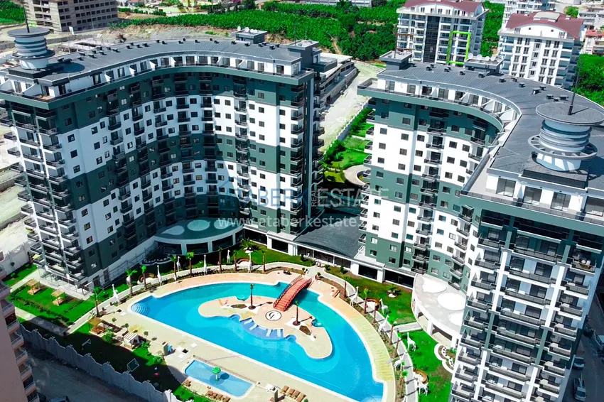 Квартира 1+1 с мебелью и видом на горы в комплексе с отельной инфраструктурой, район Махмутлар – Алания 1 