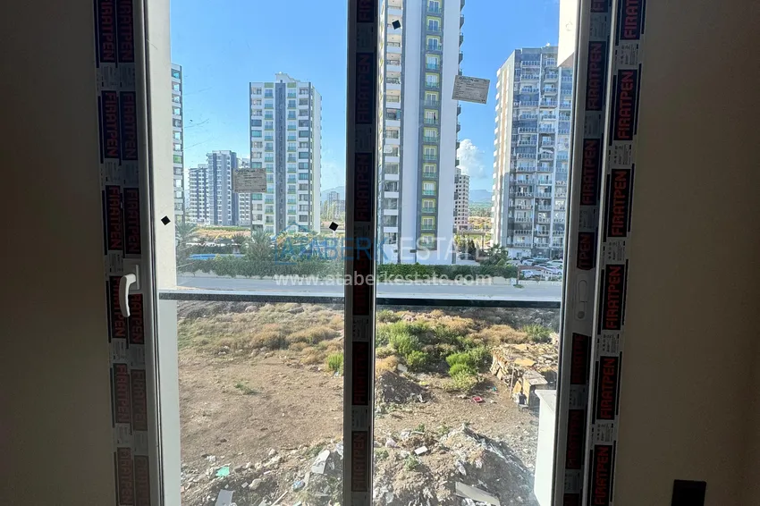 Приобрести Новая квартира 1+1 в Тедже, Мерсин, от собственника — 350 метров от моря 10 