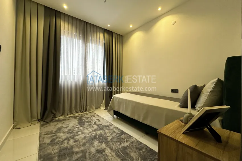 Приобрести Меблированная квартира в Махмутларе в комплексе с отельной инфраструктурой 11