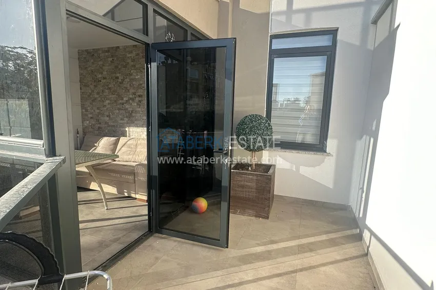 Приобрести Просторная двухкомнатная квартира с мебелью в центре Алании, район пляжа Клеопатра 15 