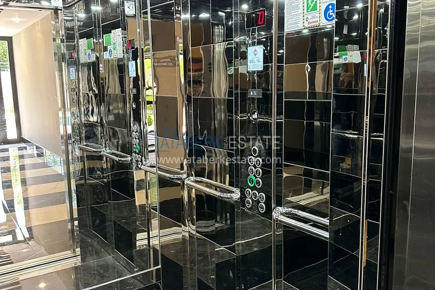 Двухкомнатная квартира с видом на горы в Алании, район Оба 14 