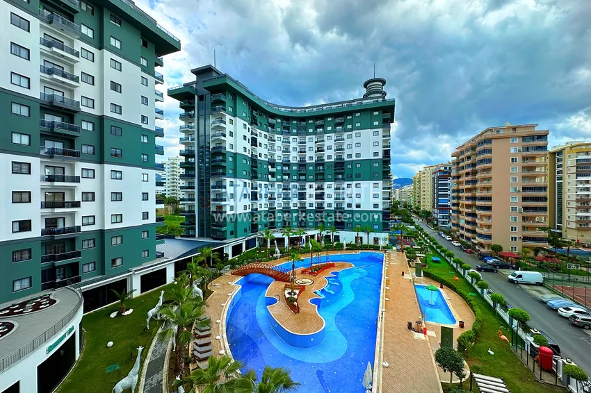 Меблированная квартира в Махмутларе в комплексе с отельной инфраструктурой 1