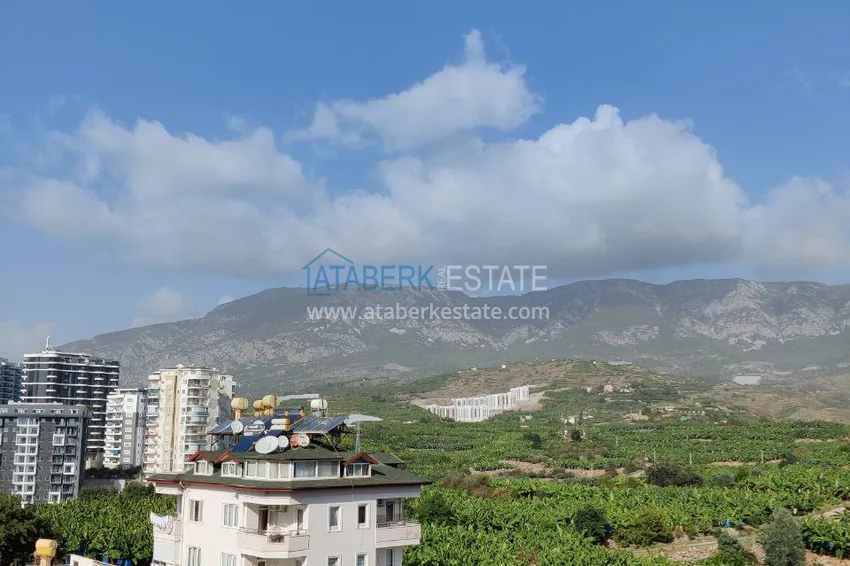 Приобрести Двухкомнатная квартира с видом на море и горы, район Махмутлар – Алания 18 