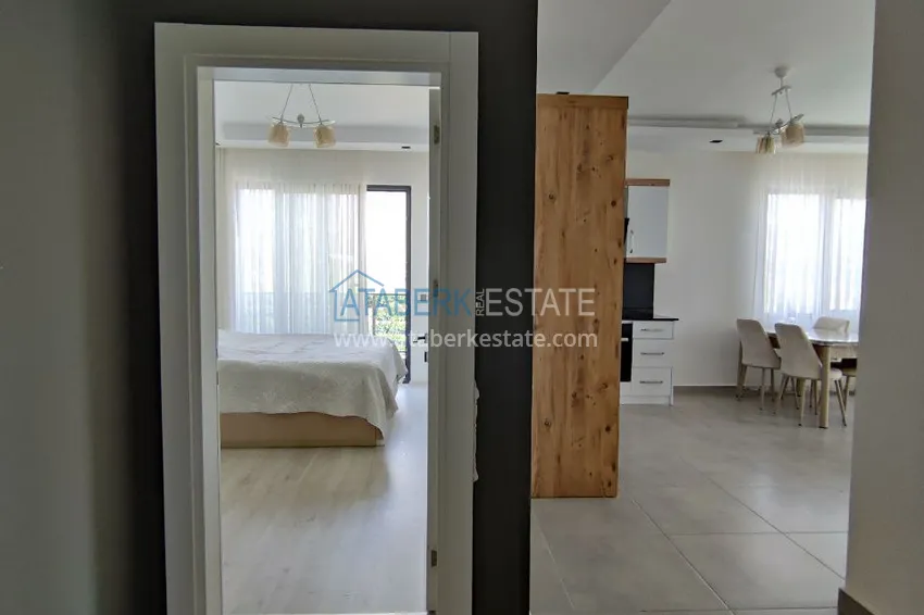 Приобрести Двухкомнатная квартира с видом на море и горы, район Махмутлар – Алания 1 