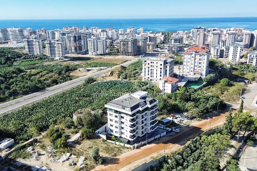 Двухкомнатная квартира с чистовой отделкой в новом комплексе – Махмутлар, Алания 1 