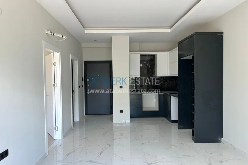 Приобрести Двухкомнатная квартира с видом на горы в Алании, район Оба 1 