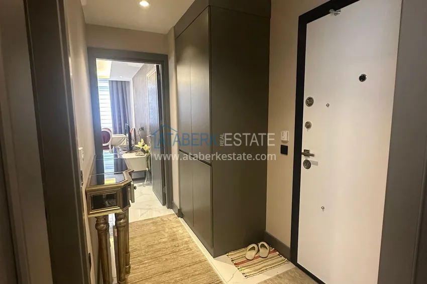 Приобрести Просторная двухкомнатная квартира с мебелью в центре Алании, район пляжа Клеопатра 2 