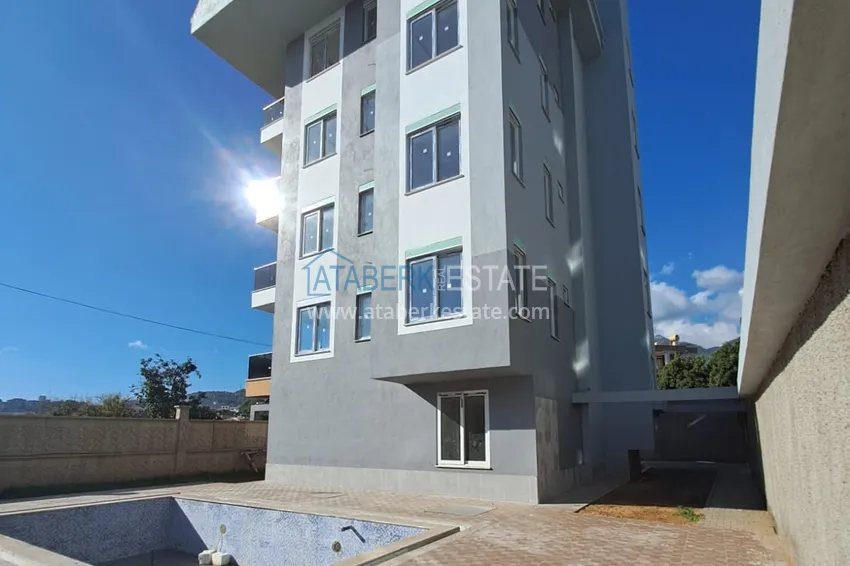 Первичная недвижимость в Алании! Двухкомнатная квартира с чистовой отделкой в районе Оба 3 