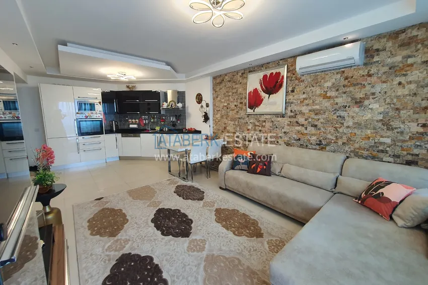 Приобрести Двухкомнатная квартира с застеклённым балконом и видом на море, первая береговая линия - район Кестель, Алания 3 