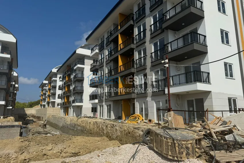 Фото - Двухкомнатная квартира в Окурджаларе в комплексе на этапе строительства в 150 метрах от моря 2 