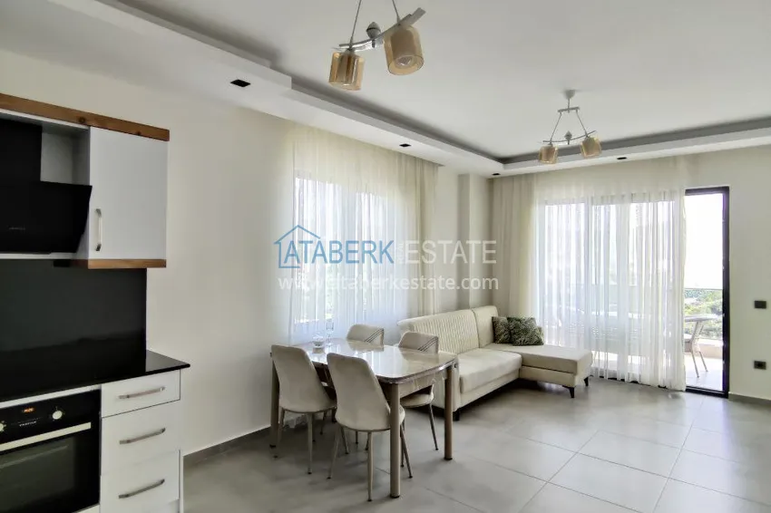 Приобрести Двухкомнатная квартира с видом на море и горы, район Махмутлар – Алания 3 