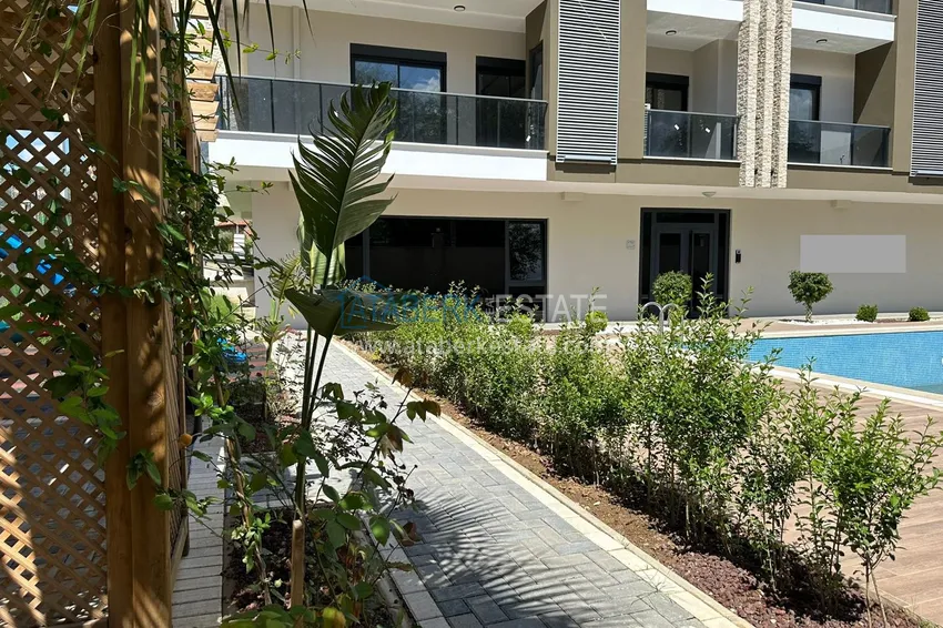 Двухкомнатная квартира с видом на горы в Алании, район Оба 4 