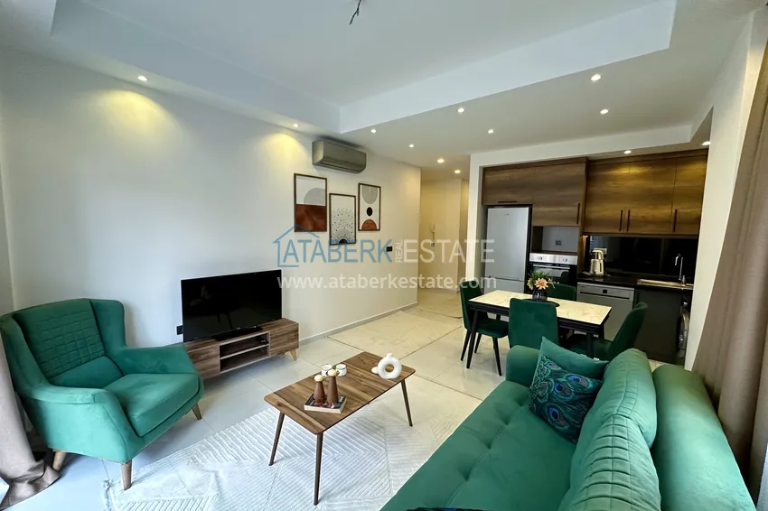 Приобрести Меблированная квартира в Махмутларе в комплексе с отельной инфраструктурой 4