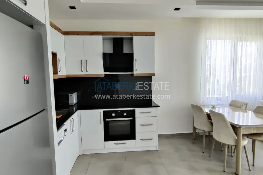 Приобрести Двухкомнатная квартира с видом на море и горы, район Махмутлар – Алания 4 