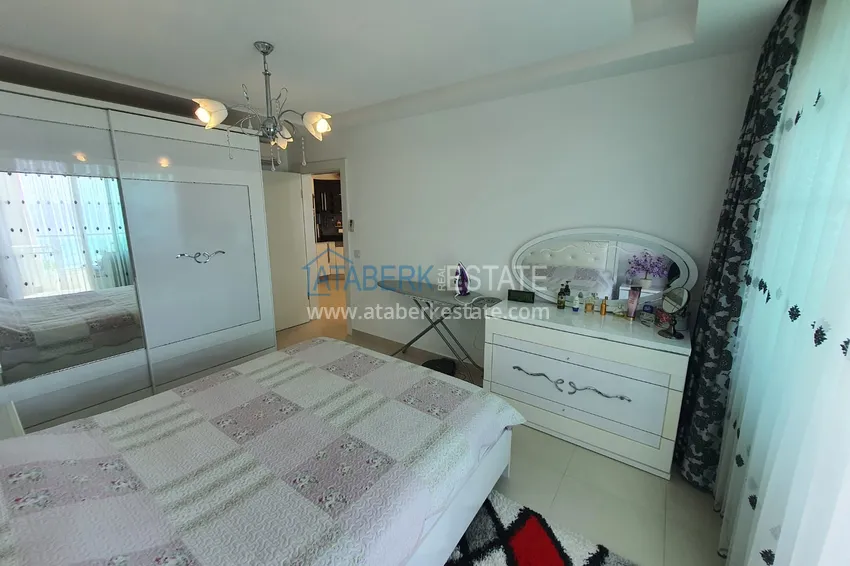 Приобрести Двухкомнатная квартира с застеклённым балконом и видом на море, первая береговая линия - район Кестель, Алания 5 