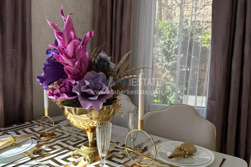 Приобрести Двухкомнатная квартира под ключ в уютном комплексе в Алании район Тосмур 6 