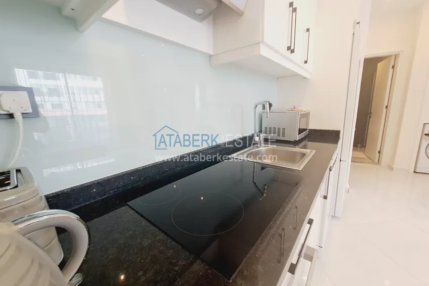 Приобрести Квартира 1+1 с мебелью и видом на горы в комплексе с отельной инфраструктурой, район Махмутлар – Алания 5 