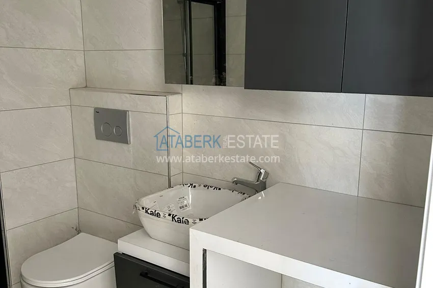 Приобрести Двухкомнатная квартира с видом на горы в Алании, район Оба 6 