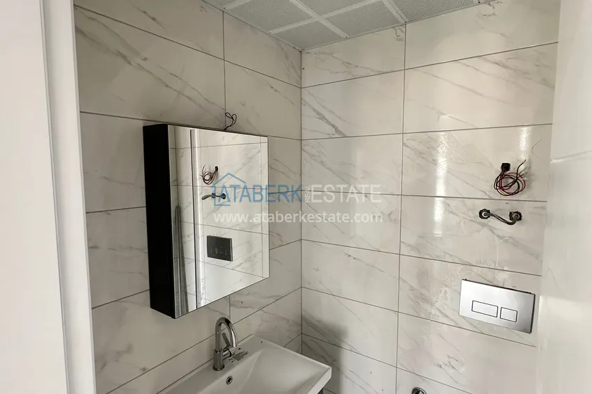 Приобрести Двухкомнатная квартира с чистовой отделкой в новом жилом комплексе - Махмутлар, Алания 6 