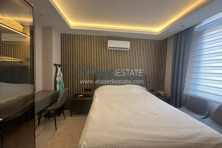 Приобрести Просторная двухкомнатная квартира с мебелью в центре Алании, район пляжа Клеопатра 7 