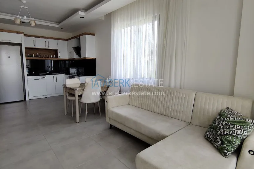 Приобрести Двухкомнатная квартира с видом на море и горы, район Махмутлар – Алания 6 