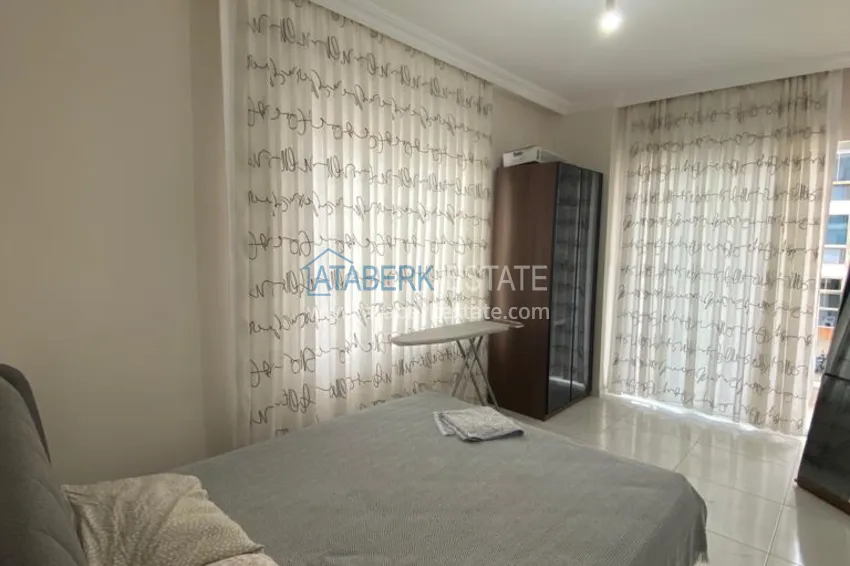 Приобрести Трехкомнатная квартира в Алании, район Оба в уютном комплексе городского типа 7 