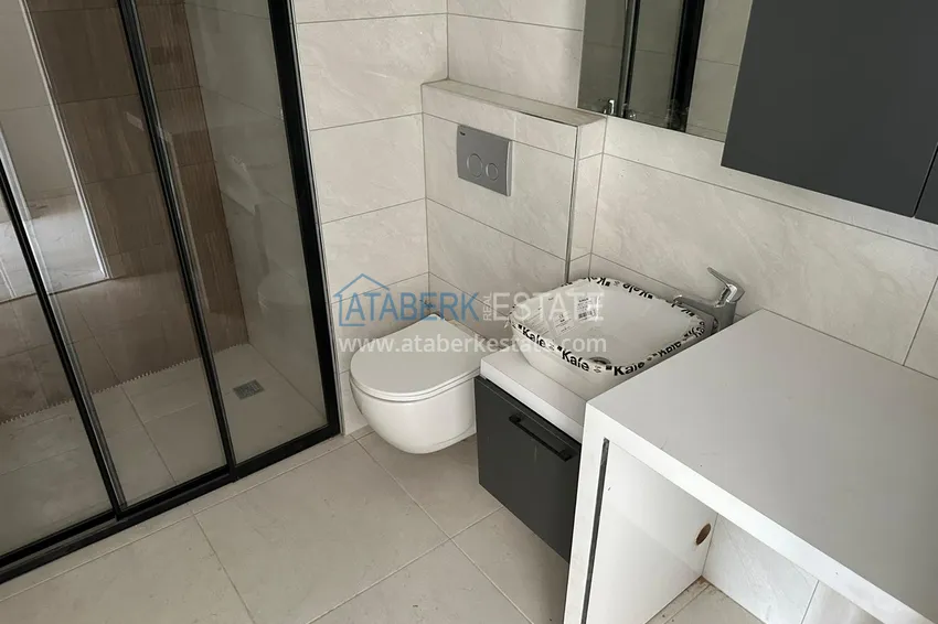 Приобрести Двухкомнатная квартира с видом на горы в Алании, район Оба 7 