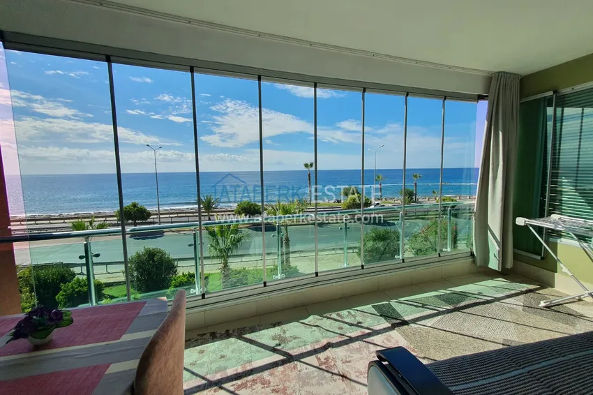 Приобрести Двухкомнатная квартира с застеклённым балконом и видом на море, первая береговая линия - район Кестель, Алания 7 