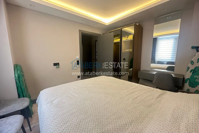 Приобрести Просторная двухкомнатная квартира с мебелью в центре Алании, район пляжа Клеопатра 8 