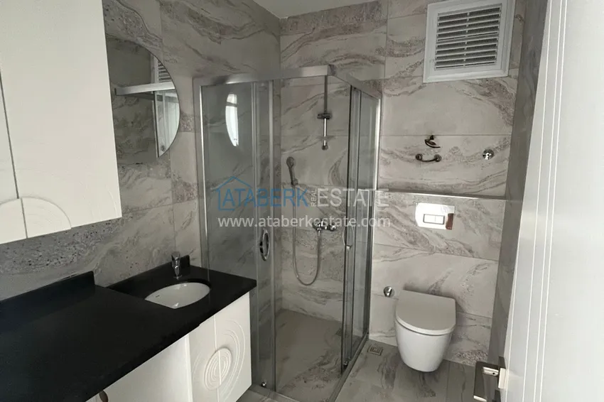 Приобрести Двухкомнатная квартира с открытым видом на море, район Махмутлар – Алания 7