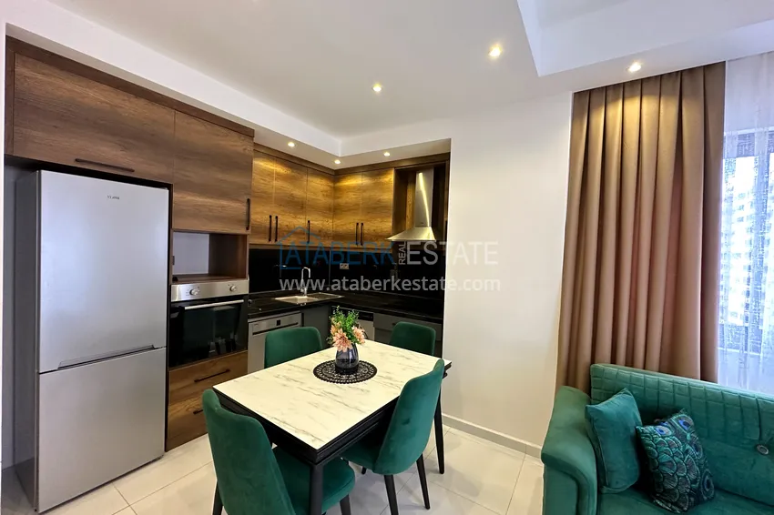 Приобрести Меблированная квартира в Махмутларе в комплексе с отельной инфраструктурой 7