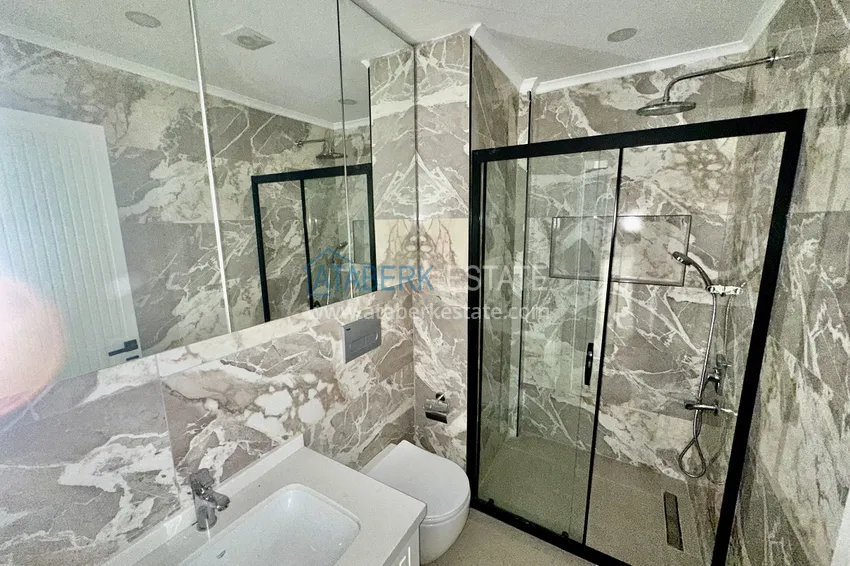 Приобрести Двухкомнатная квартира в центре Алании, всего в 370 метрах от пляжа Клеопатра 7 