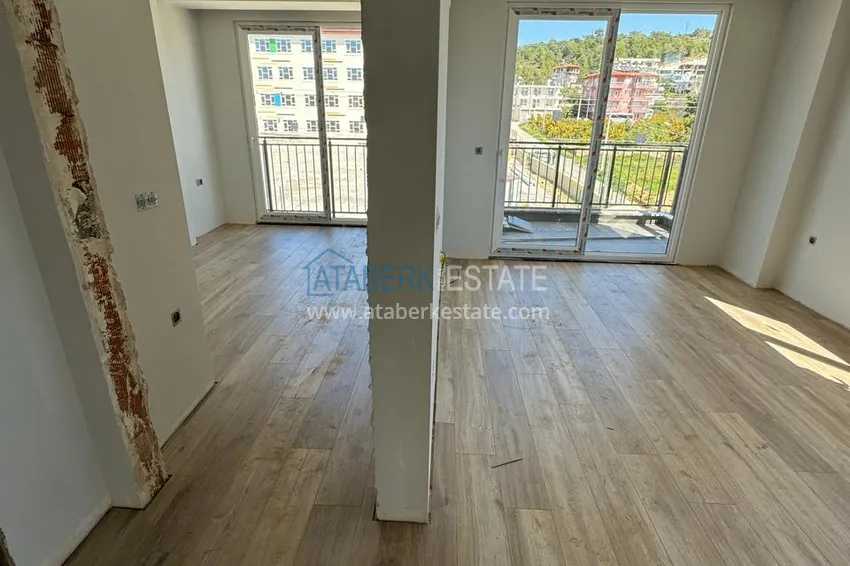 Фото - Двухкомнатная квартира в Окурджаларе в комплексе на этапе строительства в 150 метрах от моря 4 