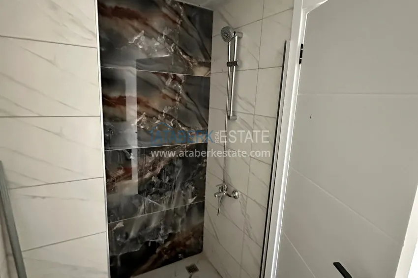 Приобрести Двухкомнатная квартира с чистовой отделкой в новом жилом комплексе - Махмутлар, Алания 8 