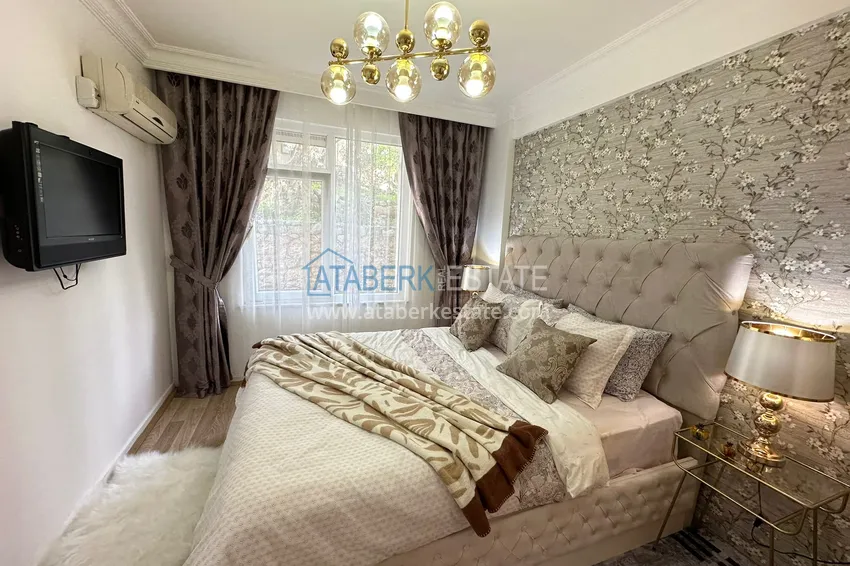 Приобрести Двухкомнатная квартира под ключ в уютном комплексе в Алании район Тосмур 9 